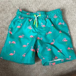 Lightly used boy swim trunks 4t